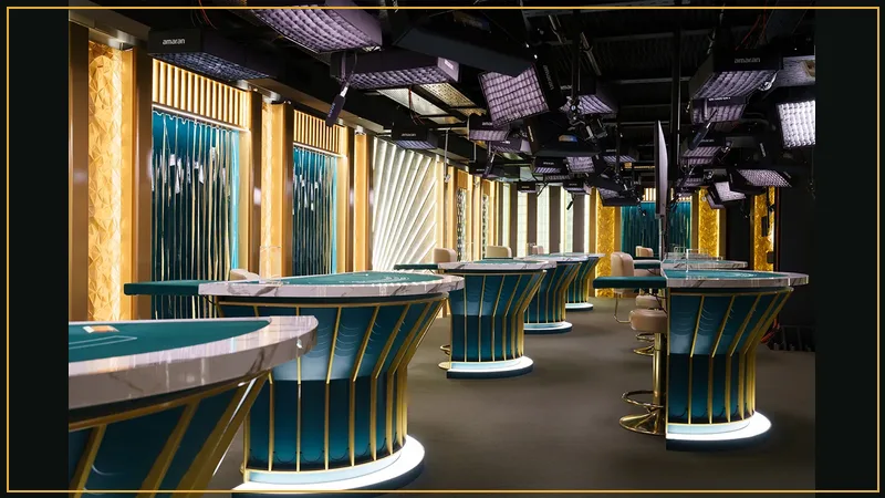 Live dealer casino floor with green felt baccarat tables and professional dealers